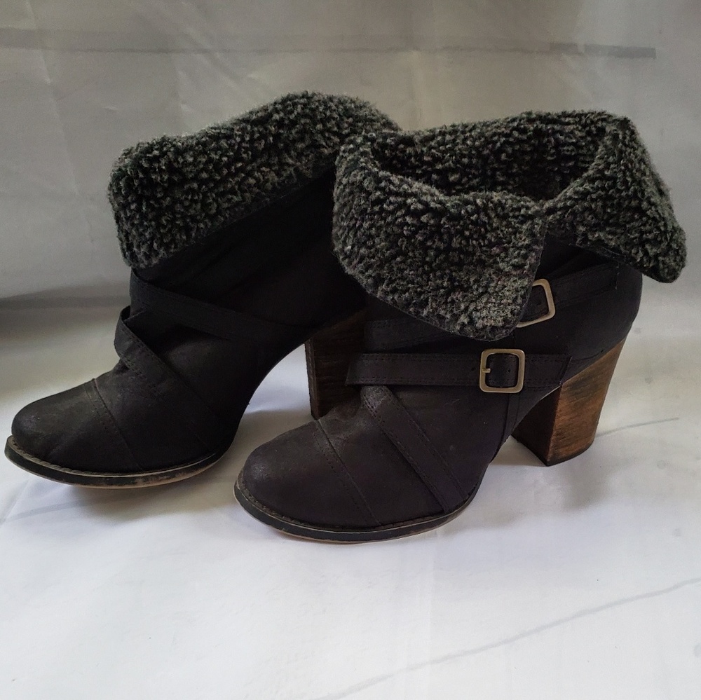 - Black boots by Chinese Laundry